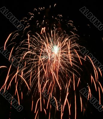 Night fireworks upon dark sky