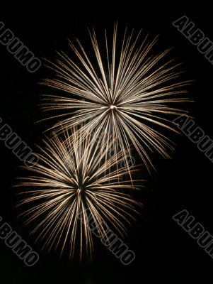 Night fireworks upon dark sky