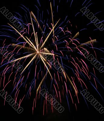 Night fireworks upon dark sky