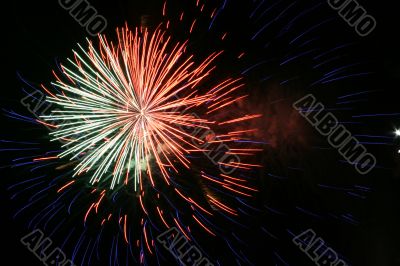 Night fireworks upon dark sky