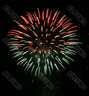 Night fireworks upon dark sky