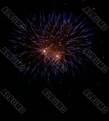 Night fireworks upon dark sky