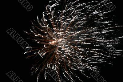 Night fireworks upon dark sky