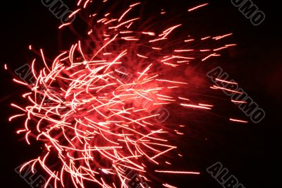 Night fireworks upon dark sky