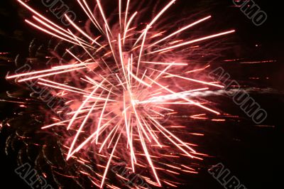 Night fireworks upon dark sky