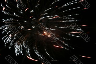 Night fireworks upon dark sky