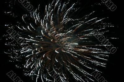 Night fireworks upon dark sky