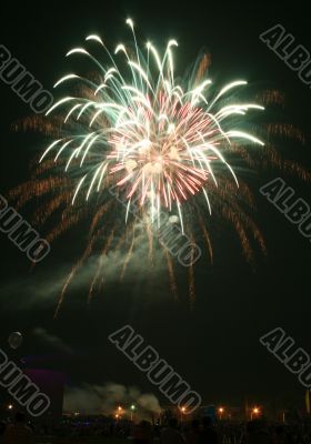 Night celebration fireworks upon dark sky