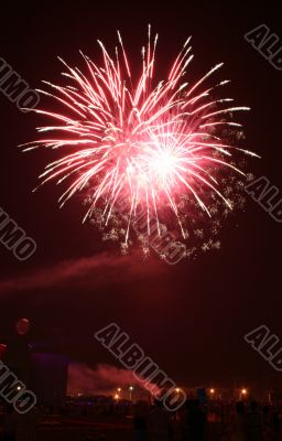 Night celebration fireworks upon dark sky