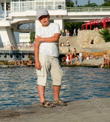 boy in front of water