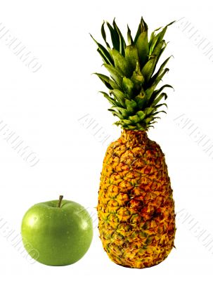 Isolated Pineapple and a Green Apple