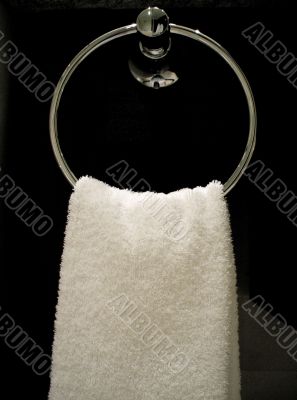 White Towel on Rack in Restroom