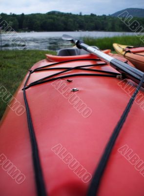 Red Kayak On Lake