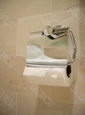 Closeup of toilet paper in bathroom