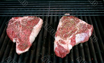 Thick Porterhouse Steaks on the Barbecue