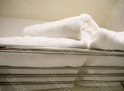 A Pile Of Folded Plush Towels