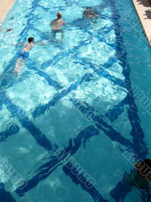 Aerial View of Swimmers in Summer Pool