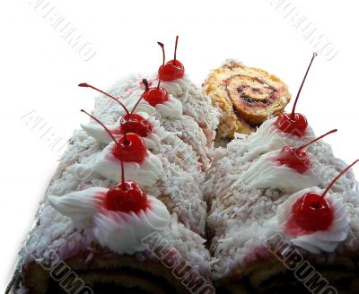 Decadent Coconut Roll Cake with Cherries on Top