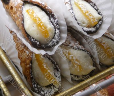 Cream Filled Cannoli Pastries in Italian Bakery