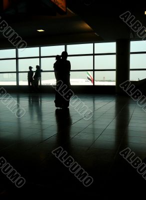Mother and Child Watching Airplanes
