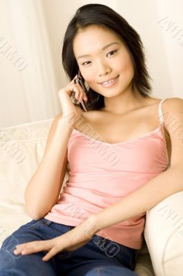 Asian Woman At Home