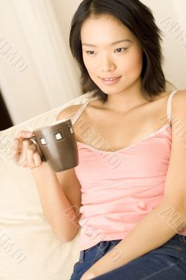 Asian Woman At Home