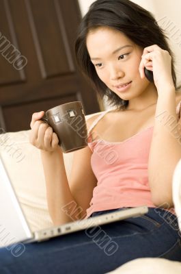 Asian Woman At Home