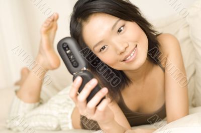 On Sofa With Phone