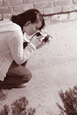 Girl with SLR photo camera