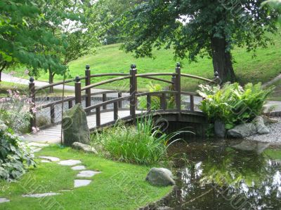 a bridge in japaneese garden
