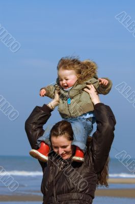 mother and child on the beach