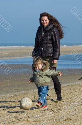 mother and child on the beach