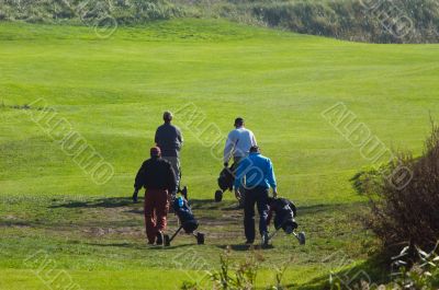 people playing golf