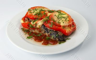 The fried tomatoes stuffed with meat and cheese.