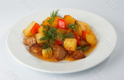 Ragout from meat, potato and sweet pepper.