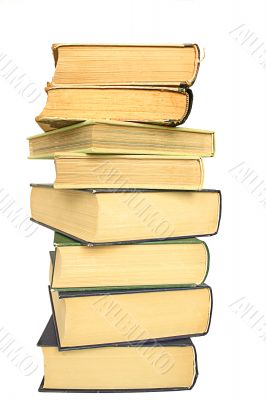 stack of yellowed books