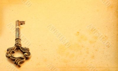 aged background with key motive
