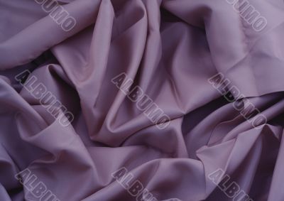 close-up of creased purple satin