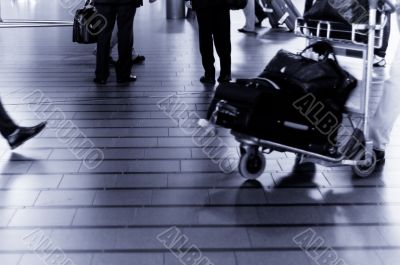 people traveling at the airport