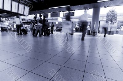 people traveling at the airport