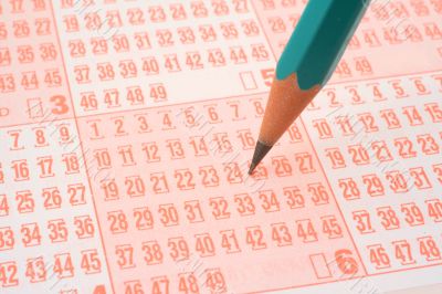 lottery ticket and pencil