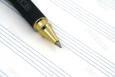 stave and ballpoint pen