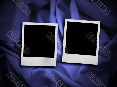 two photo frames on satin