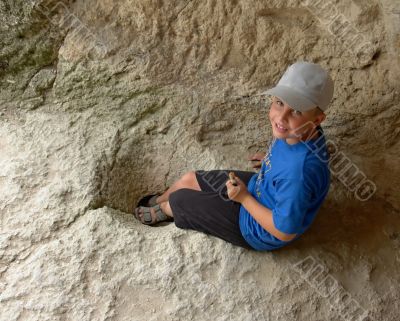 boy in cave