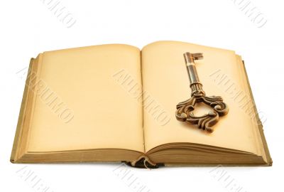open old book with key motif #2