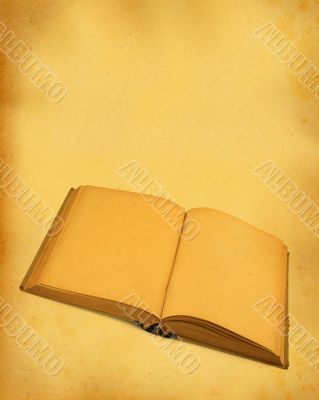 open blank book against stained dirty paper