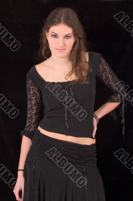 Pretty teenager in gothic clothing