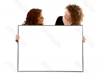 Two sisters with the big frame.