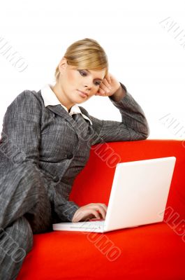 Woman on red couch