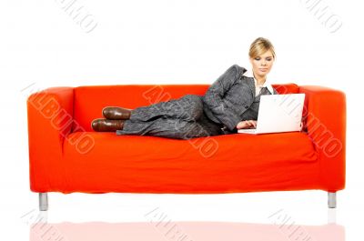 Woman on red couch